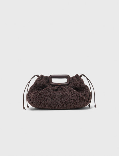 Mipli bouclé effect clutch bag | Maje