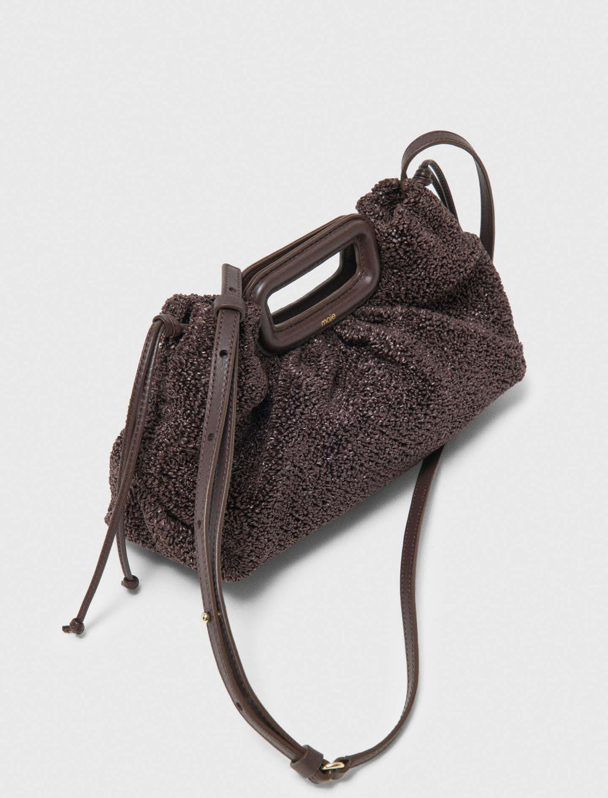 Mipli bouclé effect clutch bag | Maje