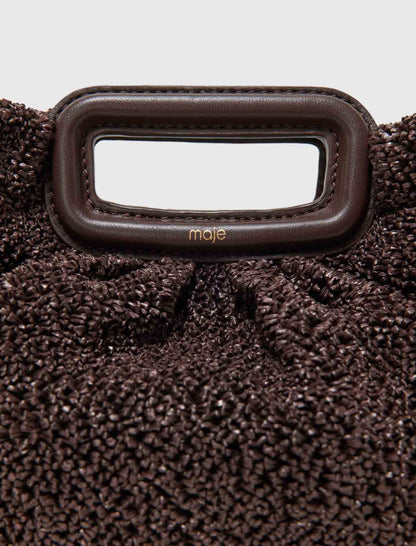 Mipli bouclé effect clutch bag | Maje