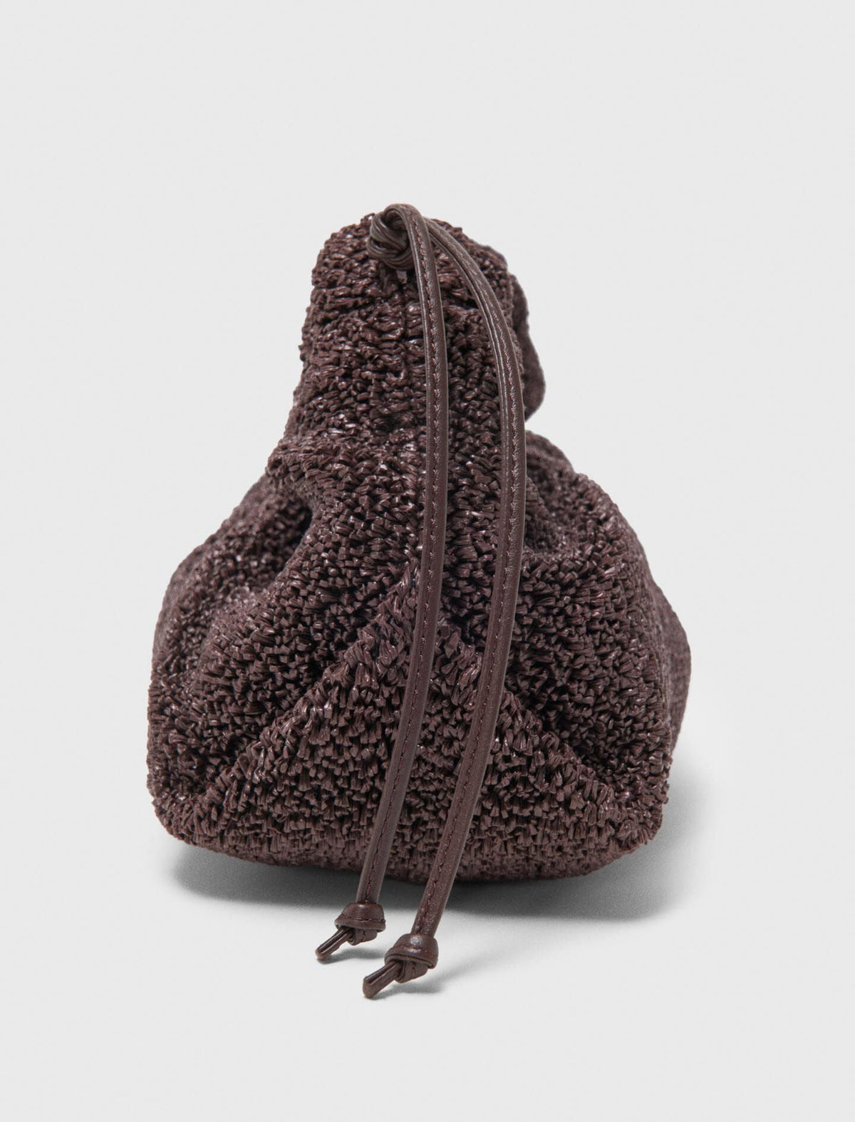 Mipli bouclé effect clutch bag | Maje