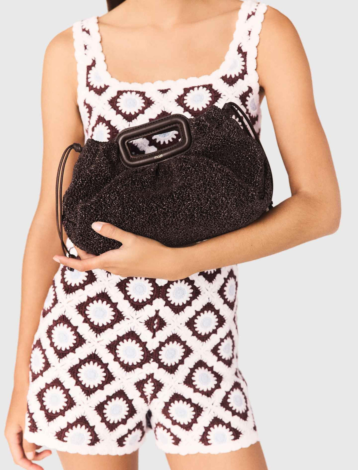 Mipli bouclé effect clutch bag | Maje