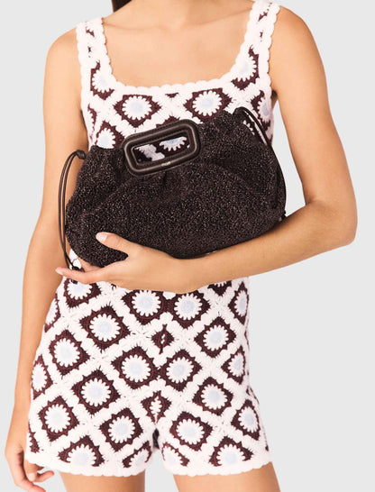 Mipli bouclé effect clutch bag | Maje