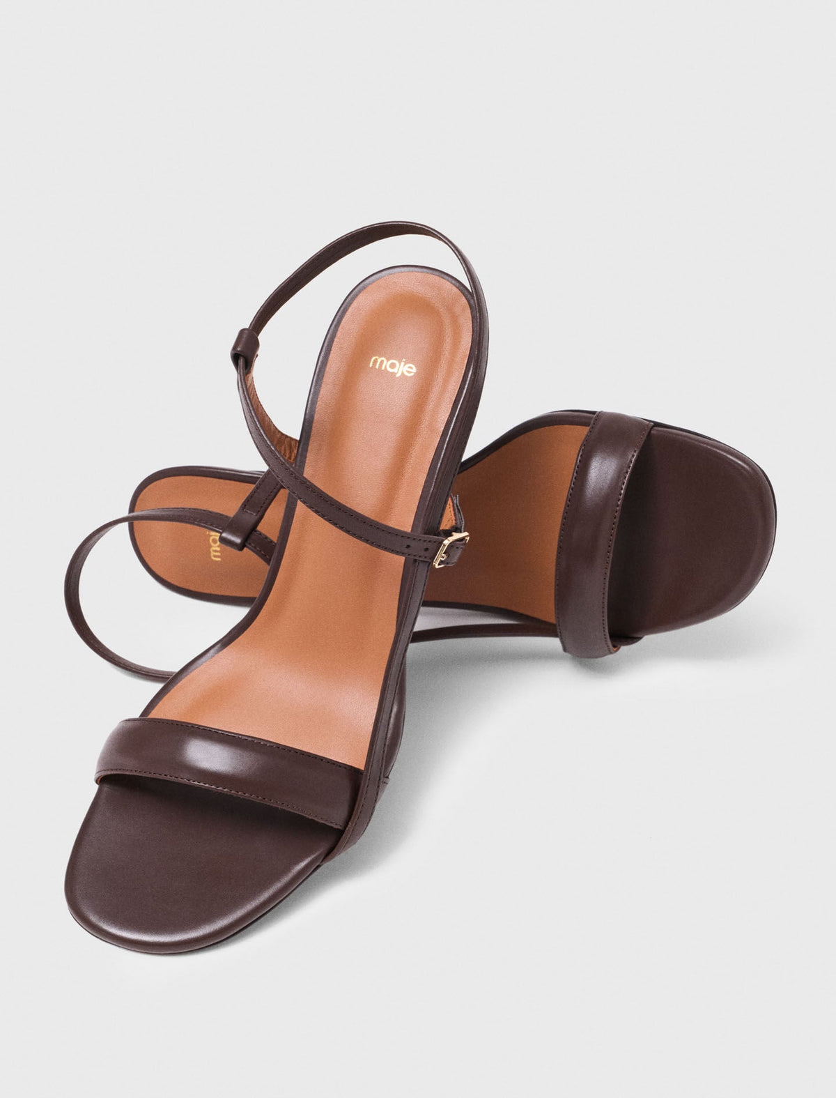 Strappy leather sandals | Maje