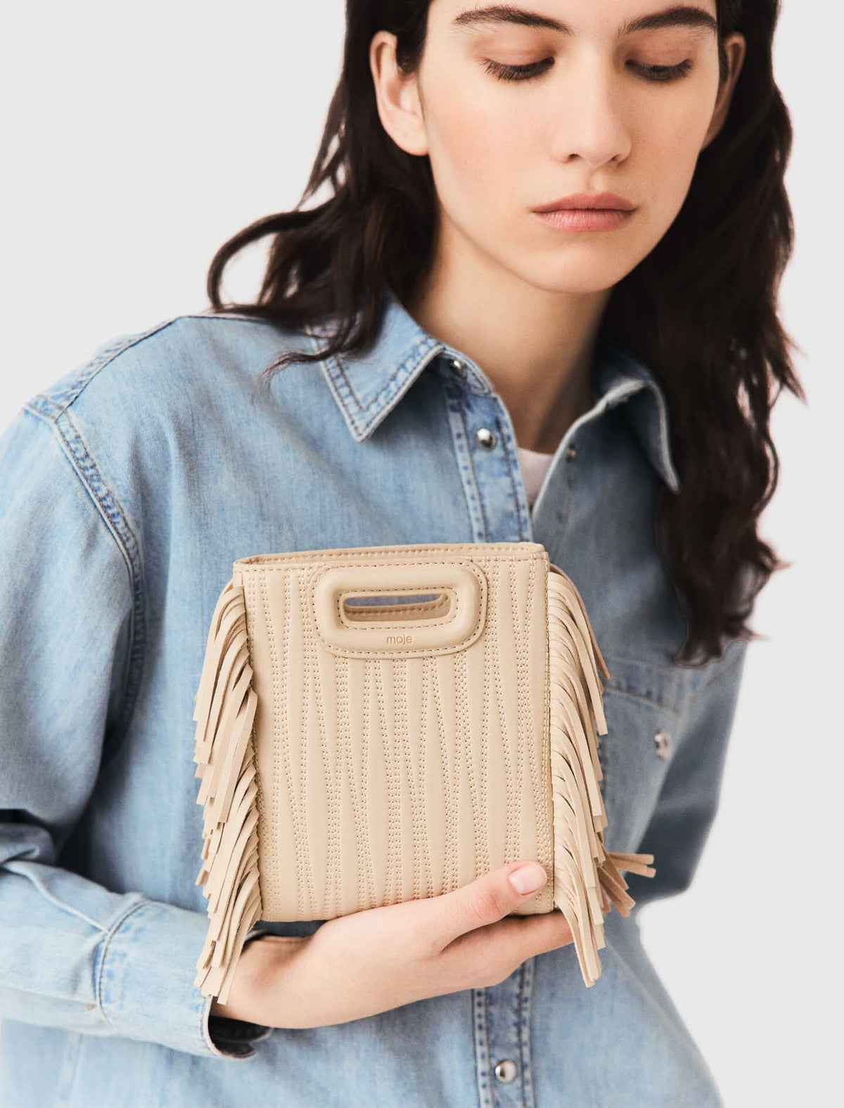Topstitched leather mini M bag | Maje