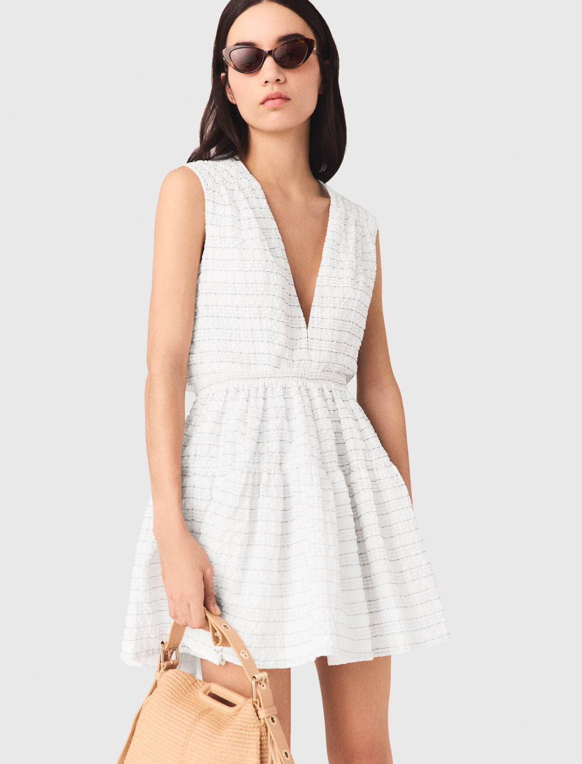 Short flared open-back dress | Maje