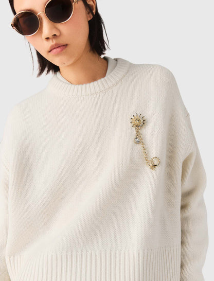 Sweater with floral brooch | Maje